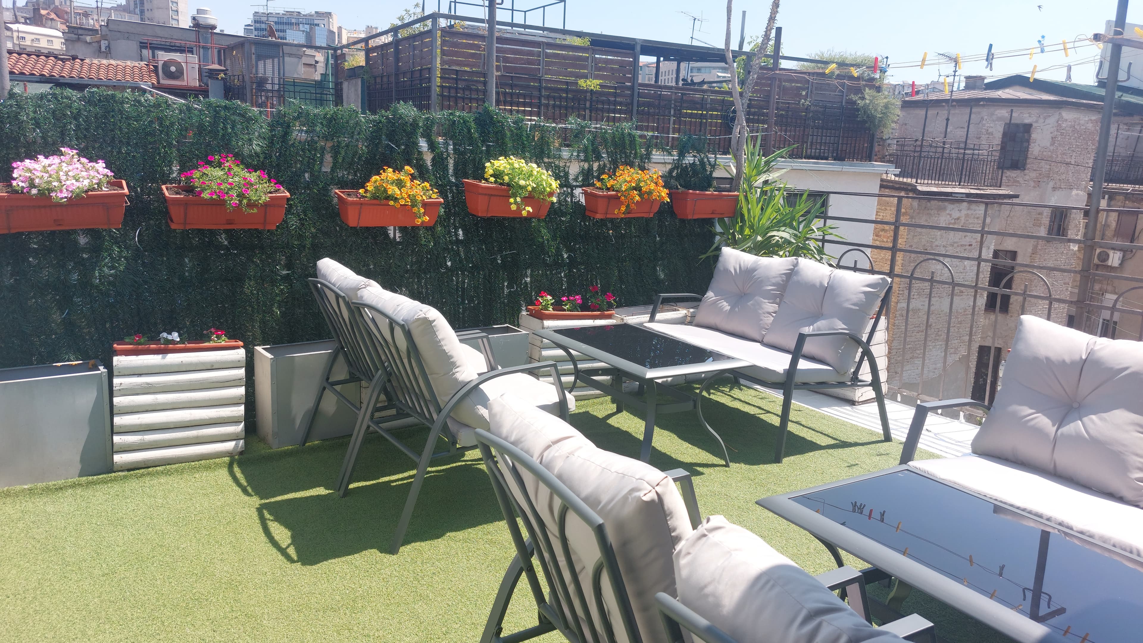 Open-air terrace corner at Hostel Downtown Inn